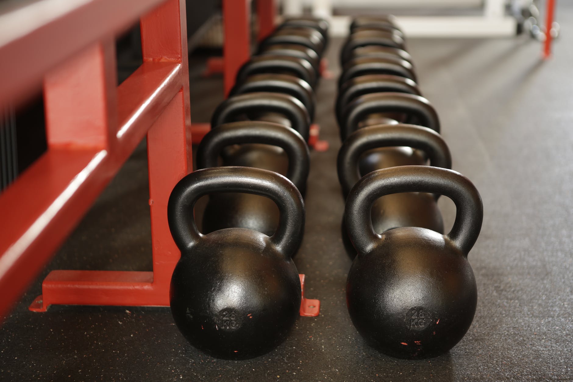 Row of black kettlebells